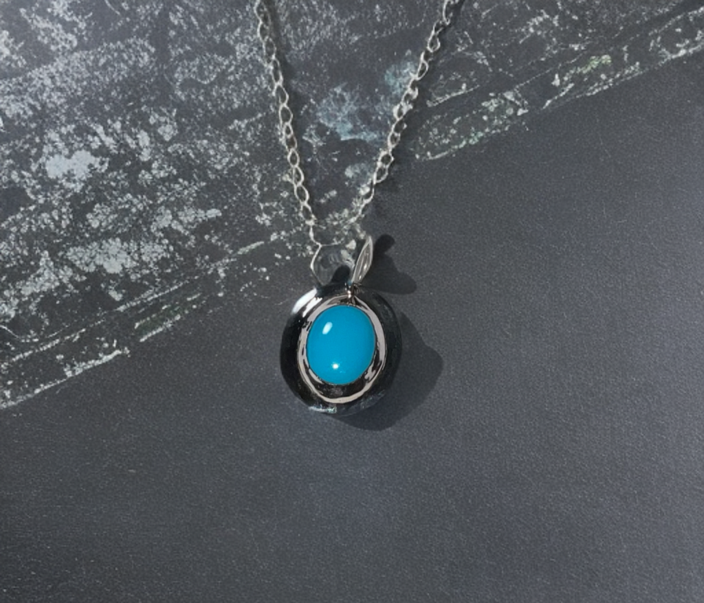 Kingman, Arizona American Mined Collection Bluebird Turquoise Hand Carved Pendant in .925 Sterling Silver (chain design is extra)