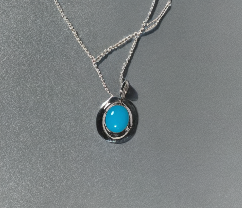 Kingman, Arizona American Mined Collection Bluebird Turquoise Hand Carved Pendant in .925 Sterling Silver (chain design is extra)