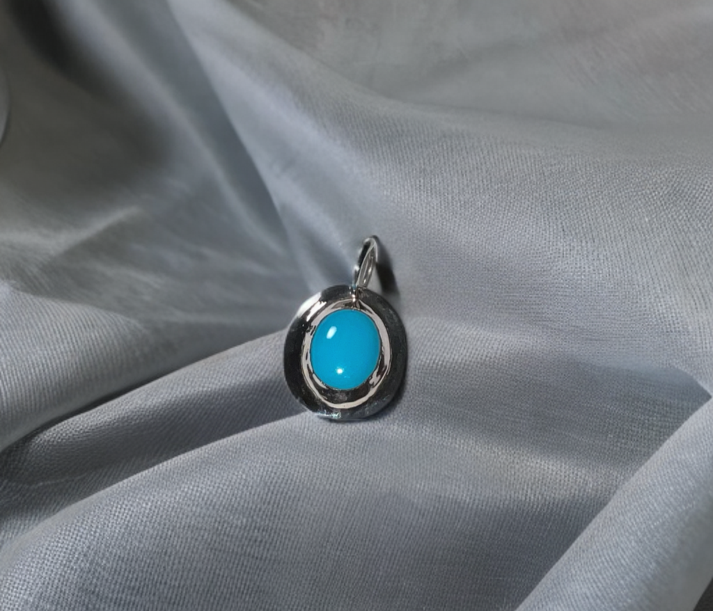 Kingman, Arizona American Mined Collection Bluebird Turquoise Hand Carved Pendant in .925 Sterling Silver (chain design is extra)